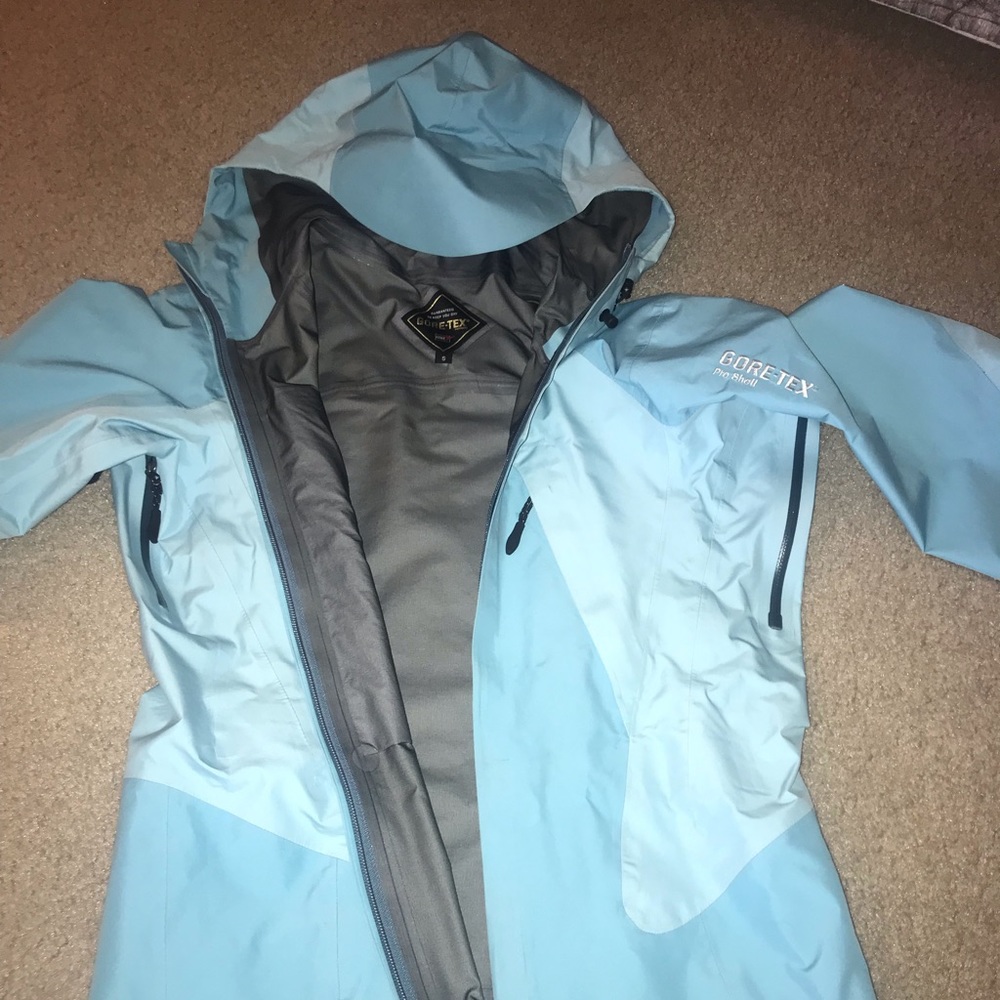 Light blue GORE-TEX Pro Shell rain jacket